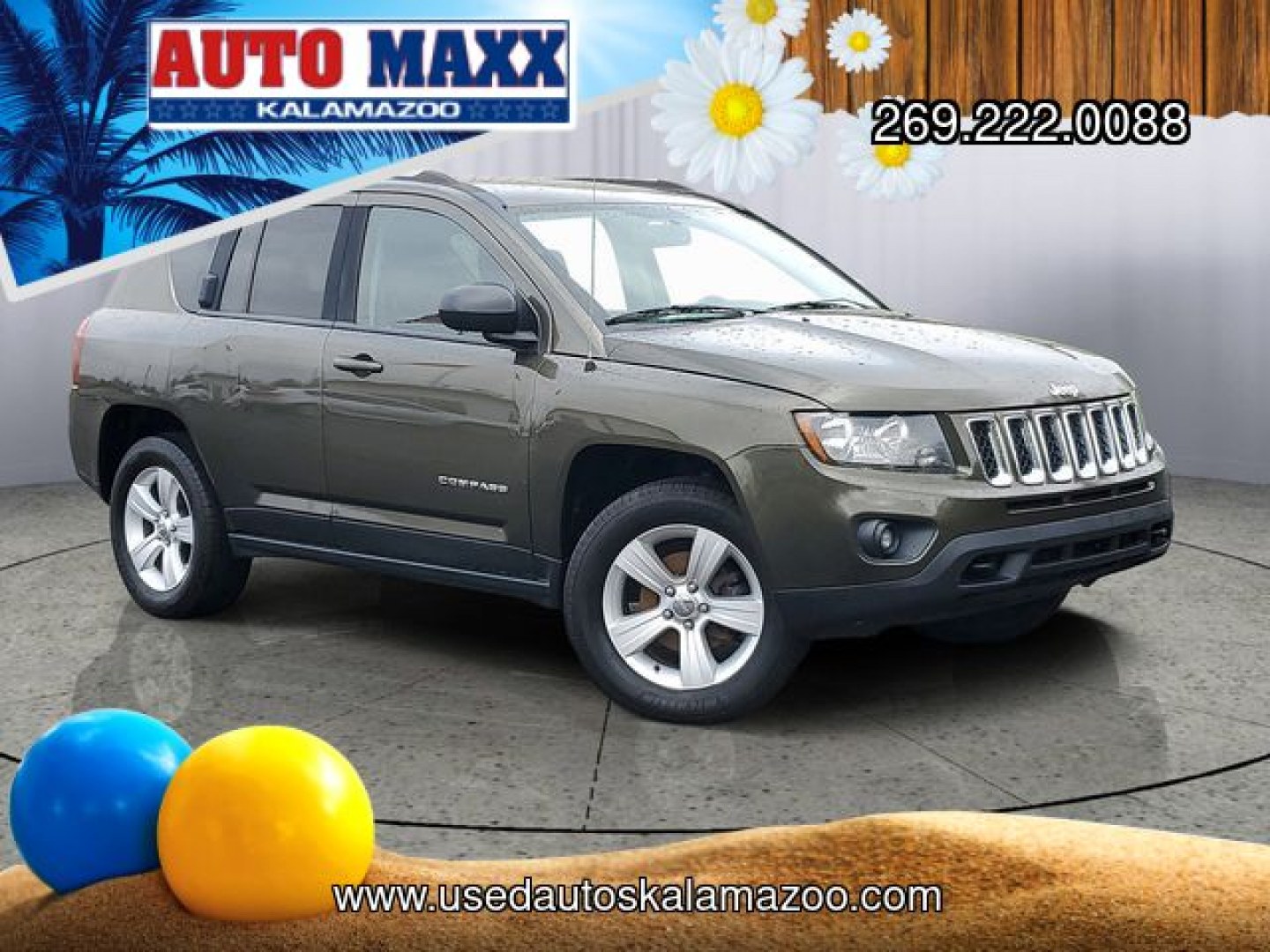2015 Green /Gray Jeep Compass Sport (1C4NJDBB8FD) with an 2.4L I4 DOHC 16V Dual VVT engine, Manual transmission, located at 6064 Gull Rd, Kalamazoo, MI, 49048, (269) 222-0088, 42.328388, -85.512924- Photo#0