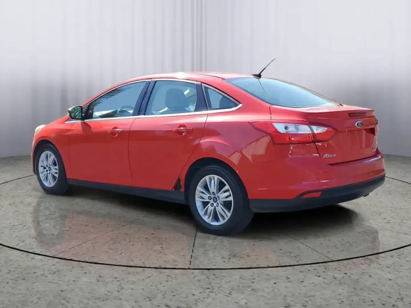 2012 /Medium Light Stone Ford Focus SEL (1FAHP3H24CL) with an 4 Cyl, 2.0L engine, 6-speed auto-shift manual transmission, located at 6064 Gull Rd, Kalamazoo, MI, 49048, (269) 222-0088, 42.328388, -85.512924 - Need a dependable commuter that keeps fuel stops and stress low while you cruise from Gull Road to Downtown Kalamazoo, campus, or the weekend farmers market? This Race Red 2012 Ford Focus SEL sedan is a smart pick for daily driving, first-time buyers, and budget-conscious shoppers who want a practic - Photo#2