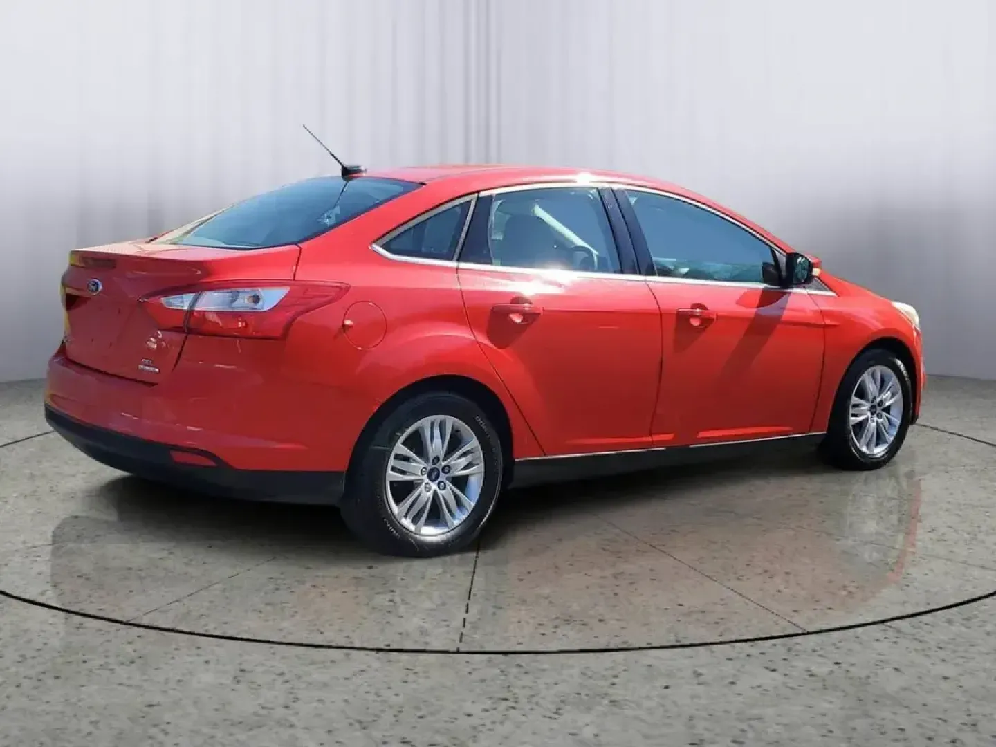 2012 /Medium Light Stone Ford Focus SEL (1FAHP3H24CL) with an 4 Cyl, 2.0L engine, 6-speed auto-shift manual transmission, located at 6064 Gull Rd, Kalamazoo, MI, 49048, (269) 222-0088, 42.328388, -85.512924 - Need a dependable commuter that keeps fuel stops and stress low while you cruise from Gull Road to Downtown Kalamazoo, campus, or the weekend farmers market? This Race Red 2012 Ford Focus SEL sedan is a smart pick for daily driving, first-time buyers, and budget-conscious shoppers who want a practic - Photo#3