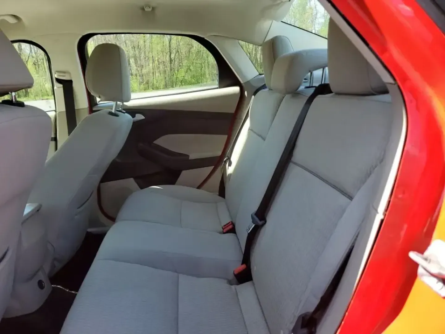2012 /Medium Light Stone Ford Focus SEL (1FAHP3H24CL) with an 4 Cyl, 2.0L engine, 6-speed auto-shift manual transmission, located at 6064 Gull Rd, Kalamazoo, MI, 49048, (269) 222-0088, 42.328388, -85.512924 - Need a dependable commuter that keeps fuel stops and stress low while you cruise from Gull Road to Downtown Kalamazoo, campus, or the weekend farmers market? This Race Red 2012 Ford Focus SEL sedan is a smart pick for daily driving, first-time buyers, and budget-conscious shoppers who want a practic - Photo#8