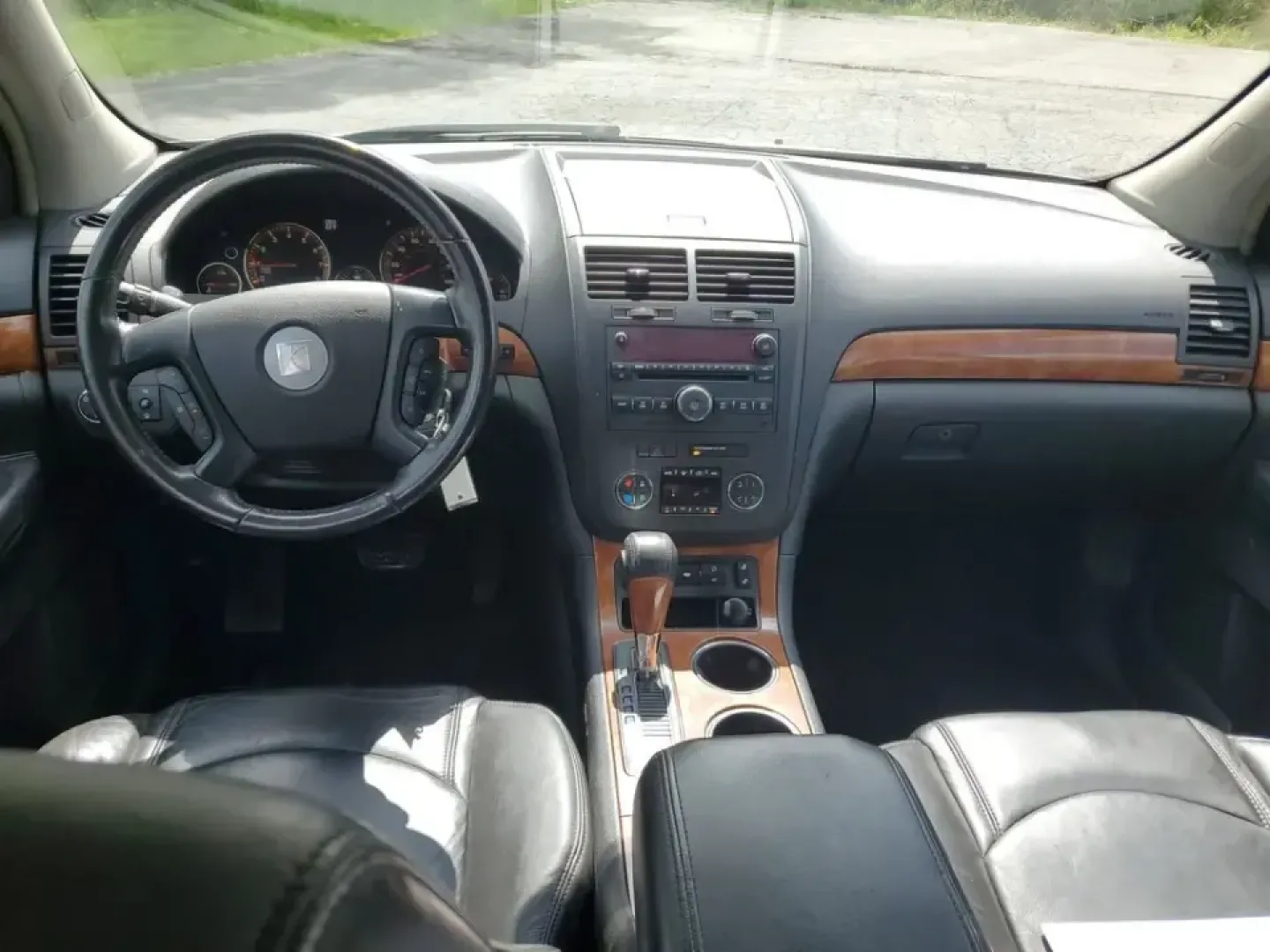 2007 /Black Saturn Outlook XR (5GZER23787J) with an V6, 3.6L engine, 6-speed automatic transmission, located at 6064 Gull Rd, Kalamazoo, MI, 49048, (269) 222-0088, 42.328388, -85.512924 - Need a spacious SUV that can handle school drop-offs, long commutes down I-94, and weekend getaways to Lake Michigan without feeling cramped? This 2007 Saturn Outlook XR is built for real-life Michigan driving-room for the whole crew, smart comfort features, and the kind of everyday versatility that - Photo#9