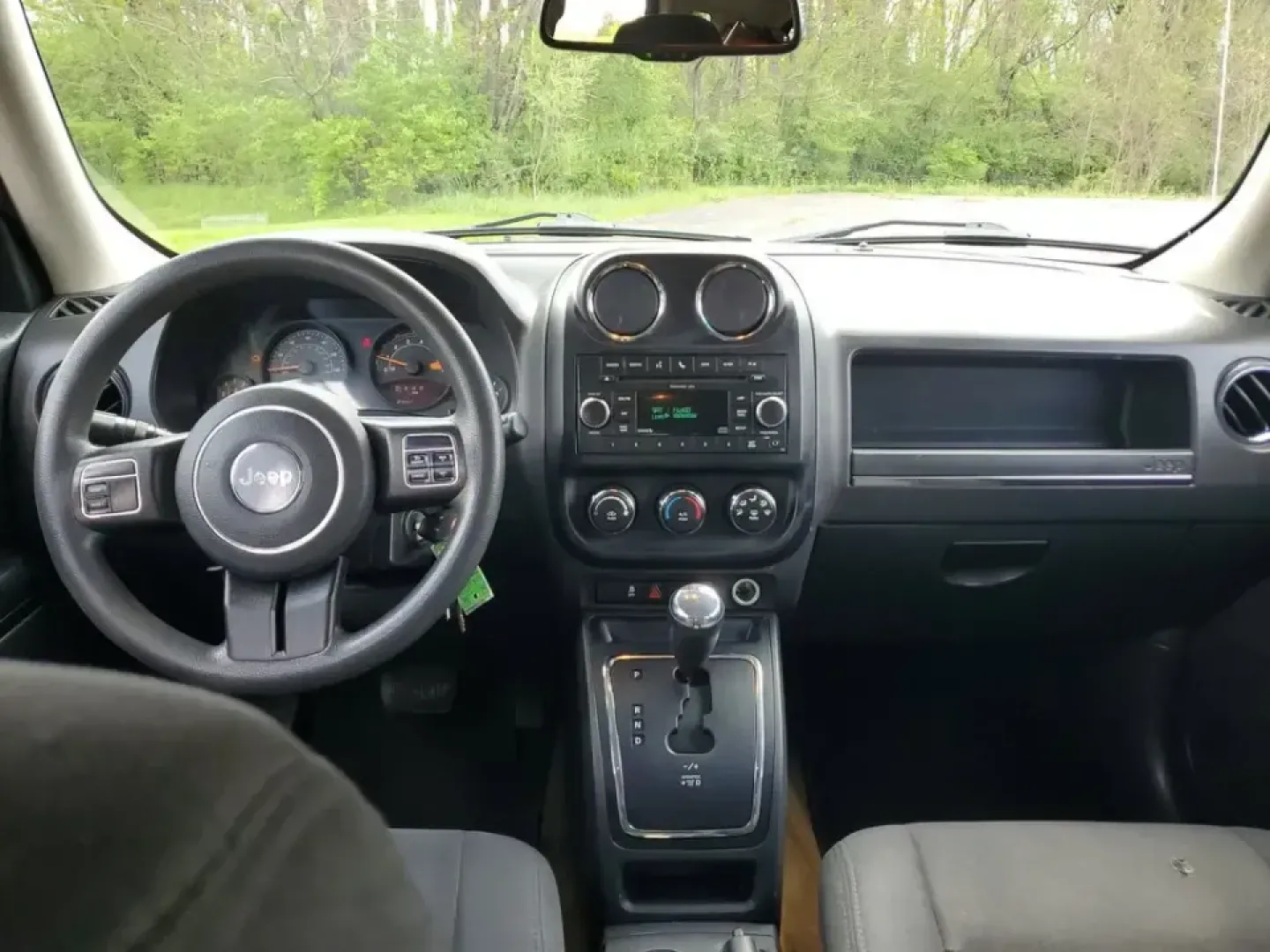 2016 /Dark Slate Gray Jeep Patriot Sport (1C4NJRBB6GD) with an 4 Cyl, 2.4L engine, 6-speed automatic transmission, located at 6064 Gull Rd, Kalamazoo, MI, 49048, (269) 222-0088, 42.328388, -85.512924 - Weekend cabin runs up to Gull Lake, snowy commutes down I-94, or a last-minute road trip to Lake Michigan-this 2016 Jeep Patriot Sport 4WD is built for Kalamazoo life when you want SUV practicality with go-anywhere confidence. If you've been searching used cars near me and want something versatile f - Photo#7