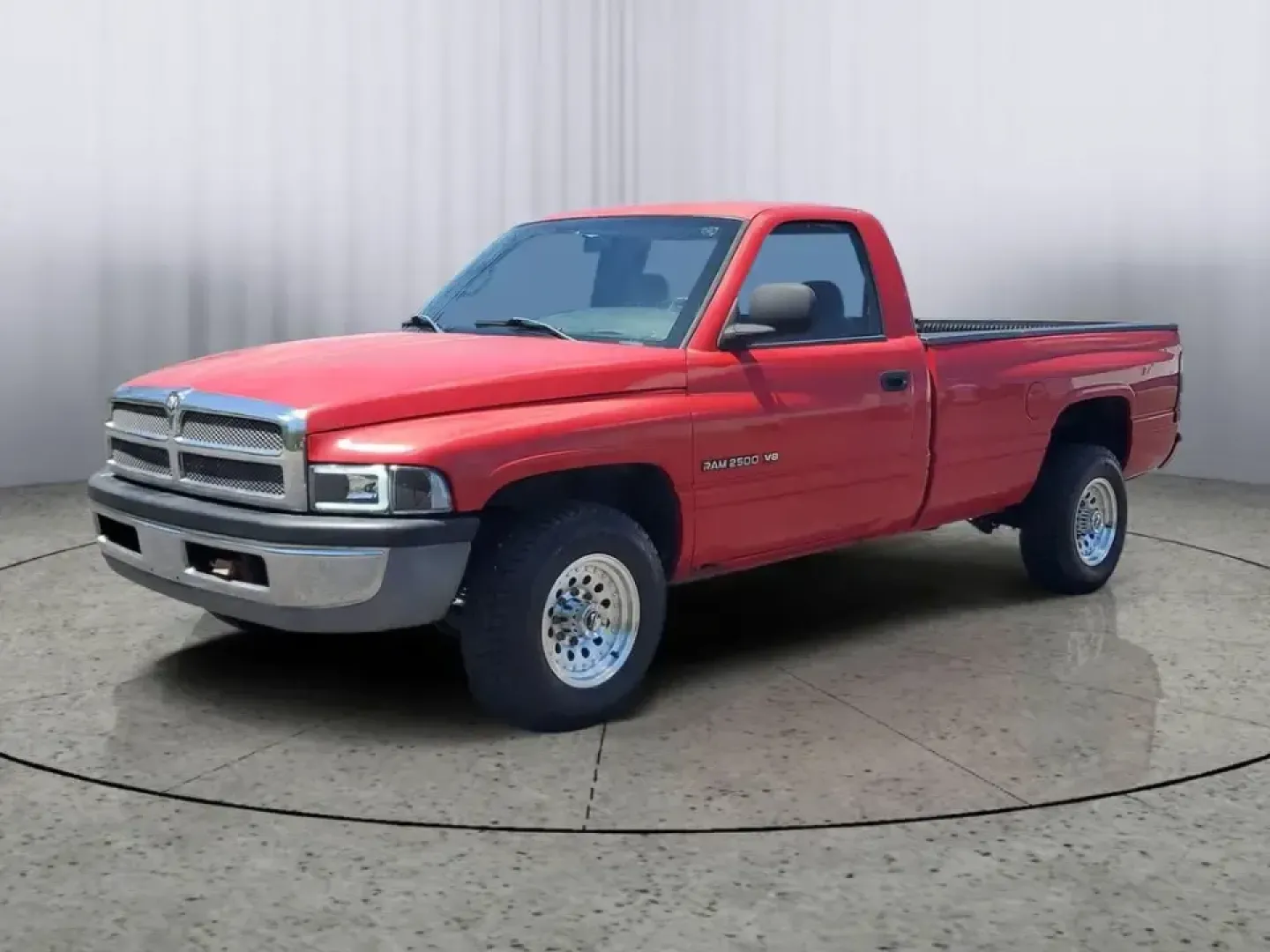 2002 Dodge Ram Pickup ST (3B7KC26Z32M) with an V8, 5.9L engine, Automatic transmission, located at 6064 Gull Rd, Kalamazoo, MI, 49048, (269) 222-0088, 42.328388, -85.512924 - Need a dependable workhorse for job sites, weekend projects, or hauling gear up and down I-94? This red 2002 Dodge Ram Pickup ST is the kind of no-nonsense truck that fits real life in Kalamazoo-whether you're commuting across town, making supply runs to Gull Road hardware stores, or heading out tow- Photo#1