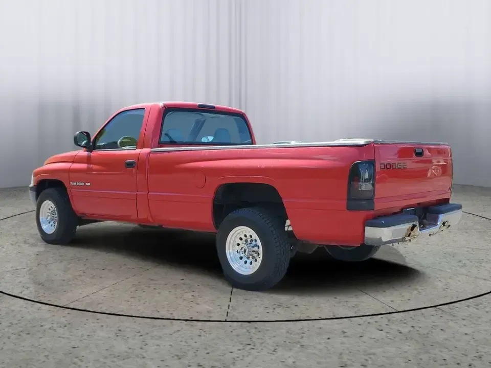 2002 Dodge Ram Pickup ST (3B7KC26Z32M) with an V8, 5.9L engine, 5-speed manual transmission, located at 6064 Gull Rd, Kalamazoo, MI, 49048, (269) 222-0088, 42.328388, -85.512924 - Need a dependable workhorse for job sites, weekend projects, or hauling gear up and down I-94? This red 2002 Dodge Ram Pickup ST is the kind of no-nonsense truck that fits real life in Kalamazoo-whether you're commuting across town, making supply runs to Gull Road hardware stores, or heading out tow - Photo#2