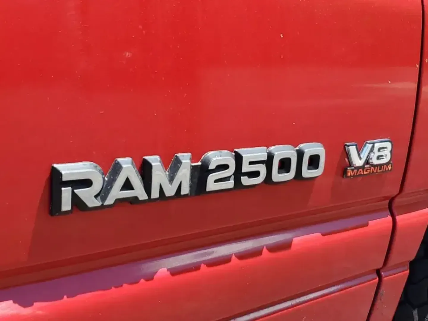 2002 Dodge Ram Pickup ST (3B7KC26Z32M) with an V8, 5.9L engine, Automatic transmission, located at 6064 Gull Rd, Kalamazoo, MI, 49048, (269) 222-0088, 42.328388, -85.512924 - Need a dependable workhorse for job sites, weekend projects, or hauling gear up and down I-94? This red 2002 Dodge Ram Pickup ST is the kind of no-nonsense truck that fits real life in Kalamazoo-whether you're commuting across town, making supply runs to Gull Road hardware stores, or heading out tow- Photo#5