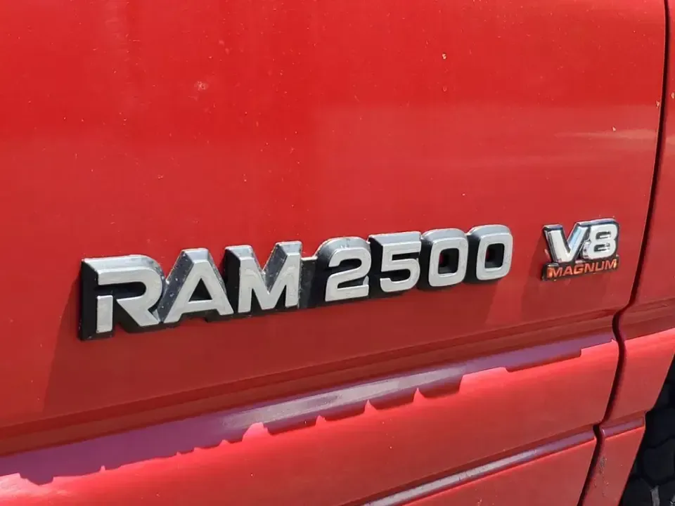 2002 Dodge Ram Pickup ST (3B7KC26Z32M) with an V8, 5.9L engine, 5-speed manual transmission, located at 6064 Gull Rd, Kalamazoo, MI, 49048, (269) 222-0088, 42.328388, -85.512924 - Need a dependable workhorse for job sites, weekend projects, or hauling gear up and down I-94? This red 2002 Dodge Ram Pickup ST is the kind of no-nonsense truck that fits real life in Kalamazoo-whether you're commuting across town, making supply runs to Gull Road hardware stores, or heading out tow - Photo#5