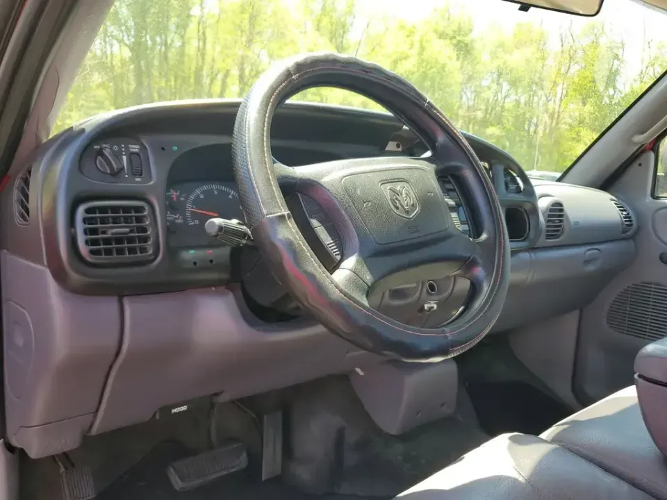 2002 Dodge Ram Pickup ST (3B7KC26Z32M) with an V8, 5.9L engine, 5-speed manual transmission, located at 6064 Gull Rd, Kalamazoo, MI, 49048, (269) 222-0088, 42.328388, -85.512924 - Need a dependable workhorse for job sites, weekend projects, or hauling gear up and down I-94? This red 2002 Dodge Ram Pickup ST is the kind of no-nonsense truck that fits real life in Kalamazoo-whether you're commuting across town, making supply runs to Gull Road hardware stores, or heading out tow - Photo#10