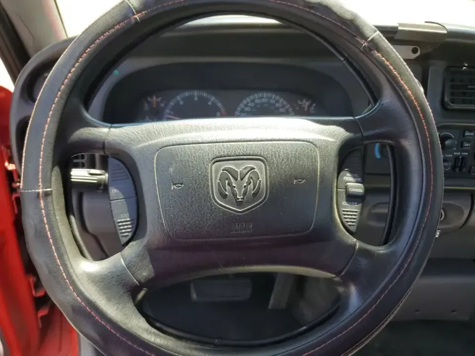 2002 Dodge Ram Pickup ST (3B7KC26Z32M) with an V8, 5.9L engine, 5-speed manual transmission, located at 6064 Gull Rd, Kalamazoo, MI, 49048, (269) 222-0088, 42.328388, -85.512924 - Need a dependable workhorse for job sites, weekend projects, or hauling gear up and down I-94? This red 2002 Dodge Ram Pickup ST is the kind of no-nonsense truck that fits real life in Kalamazoo-whether you're commuting across town, making supply runs to Gull Road hardware stores, or heading out tow - Photo#12