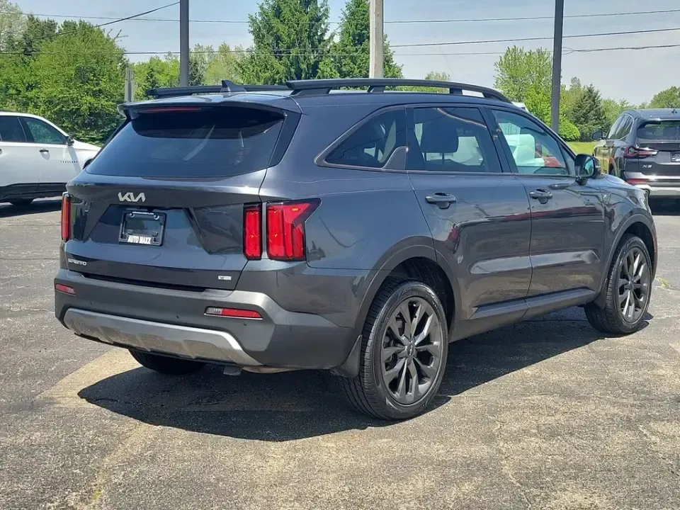 2023 /Black Kia Sorento X-Line SX Prestige (5XYRKDLF3PG) with an 4 Cyl, 2.5L engine, 8-speed auto-shift manual transmission, located at 6064 Gull Rd, Kalamazoo, MI, 49048, (269) 222-0088, 42.328388, -85.512924 - For families juggling school drop-offs, long commutes up and down I-94, and weekend escapes to Lake Michigan, this 2023 Kia Sorento X-Line SX Prestige AWD is built to keep life moving in comfort and confidence. With three-row flexibility, upscale tech, and all-weather capability, it's an easy fit fo - Photo#3