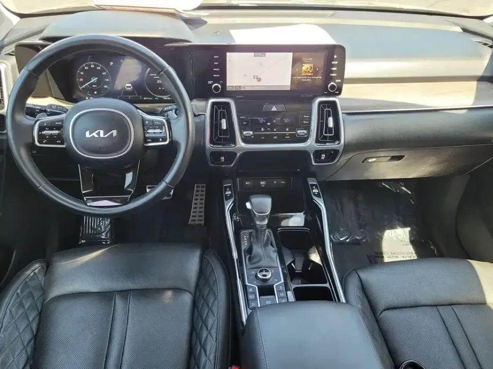 2023 /Black Kia Sorento X-Line SX Prestige (5XYRKDLF3PG) with an 4 Cyl, 2.5L engine, 8-speed auto-shift manual transmission, located at 6064 Gull Rd, Kalamazoo, MI, 49048, (269) 222-0088, 42.328388, -85.512924 - For families juggling school drop-offs, long commutes up and down I-94, and weekend escapes to Lake Michigan, this 2023 Kia Sorento X-Line SX Prestige AWD is built to keep life moving in comfort and confidence. With three-row flexibility, upscale tech, and all-weather capability, it's an easy fit fo - Photo#31