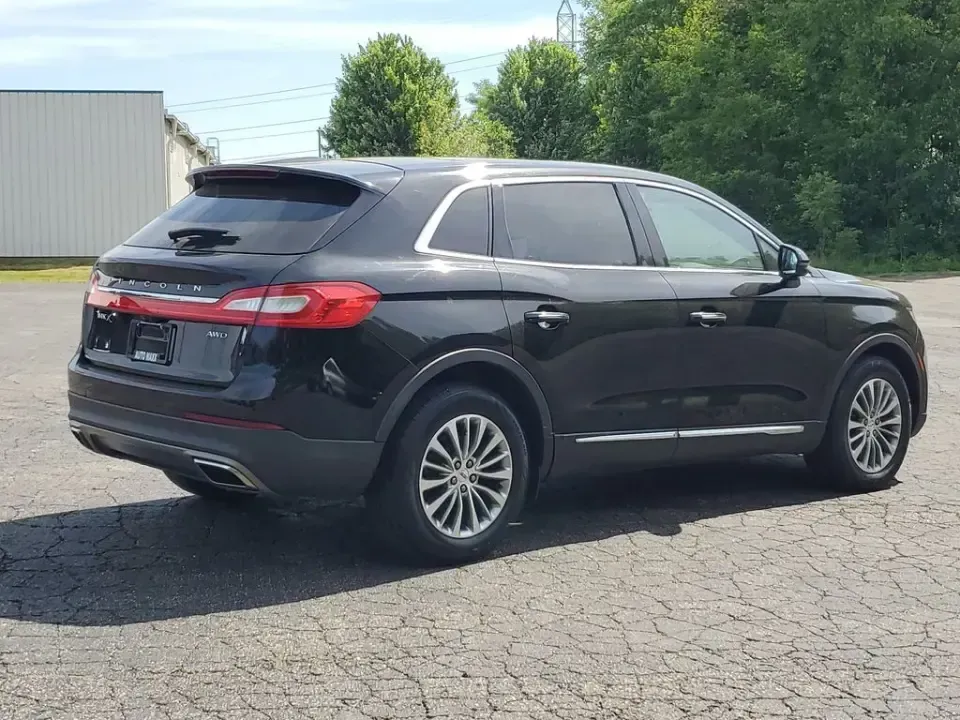 2018 /Ebony Lincoln MKX Select (2LMPJ8KR6JB) with an V6, 3.7L engine, 6-speed automatic transmission, located at 6064 Gull Rd, Kalamazoo, MI, 49048, (269) 222-0088, 42.328388, -85.512924 - Weekend getaways to South Haven, daily commutes down Gull Road, or family errands between Downtown Kalamazoo and Portage-this 2018 Lincoln MKX Select AWD is built for real life, with upscale comfort and all-weather confidence that fits Michigan seasons. If you've been searching used cars near me and - Photo#3