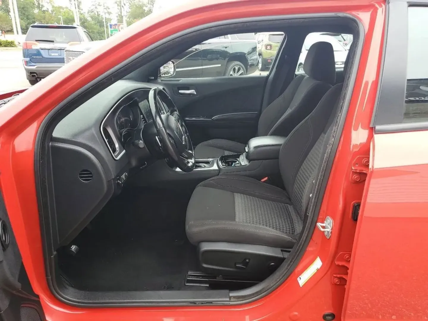 2020 Torred Clearcoat /Black Dodge Charger SXT (2C3CDXJG7LH) with an V6, 3.6L engine, 8-speed automatic transmission, located at 6064 Gull Rd, Kalamazoo, MI, 49048, (269) 222-0088, 42.328388, -85.512924 - <b>Summary</b><br>Aftermarket sport exhaust<br><br><b>Vehicle Details</b><br>Aftermarket sport exhaust. Looking for a dynamic blend of performance and comfort? Check out this 2020 Dodge Charger SXT, equipped with All-Wheel Drive and a powerful V6, 3.6L engine. This standout sedan balances thrilling - Photo#8