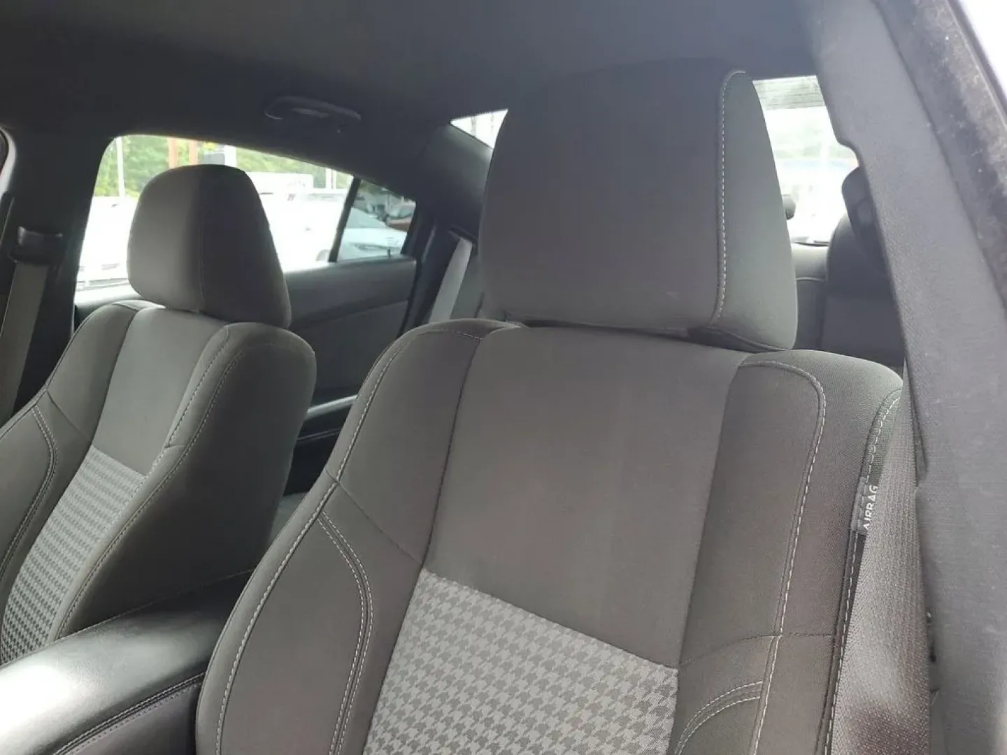 2020 Torred Clearcoat /Black Dodge Charger SXT (2C3CDXJG7LH) with an V6, 3.6L engine, 8-speed automatic transmission, located at 6064 Gull Rd, Kalamazoo, MI, 49048, (269) 222-0088, 42.328388, -85.512924 - <b>Summary</b><br>Aftermarket sport exhaust<br><br><b>Vehicle Details</b><br>Aftermarket sport exhaust. Looking for a dynamic blend of performance and comfort? Check out this 2020 Dodge Charger SXT, equipped with All-Wheel Drive and a powerful V6, 3.6L engine. This standout sedan balances thrilling - Photo#10