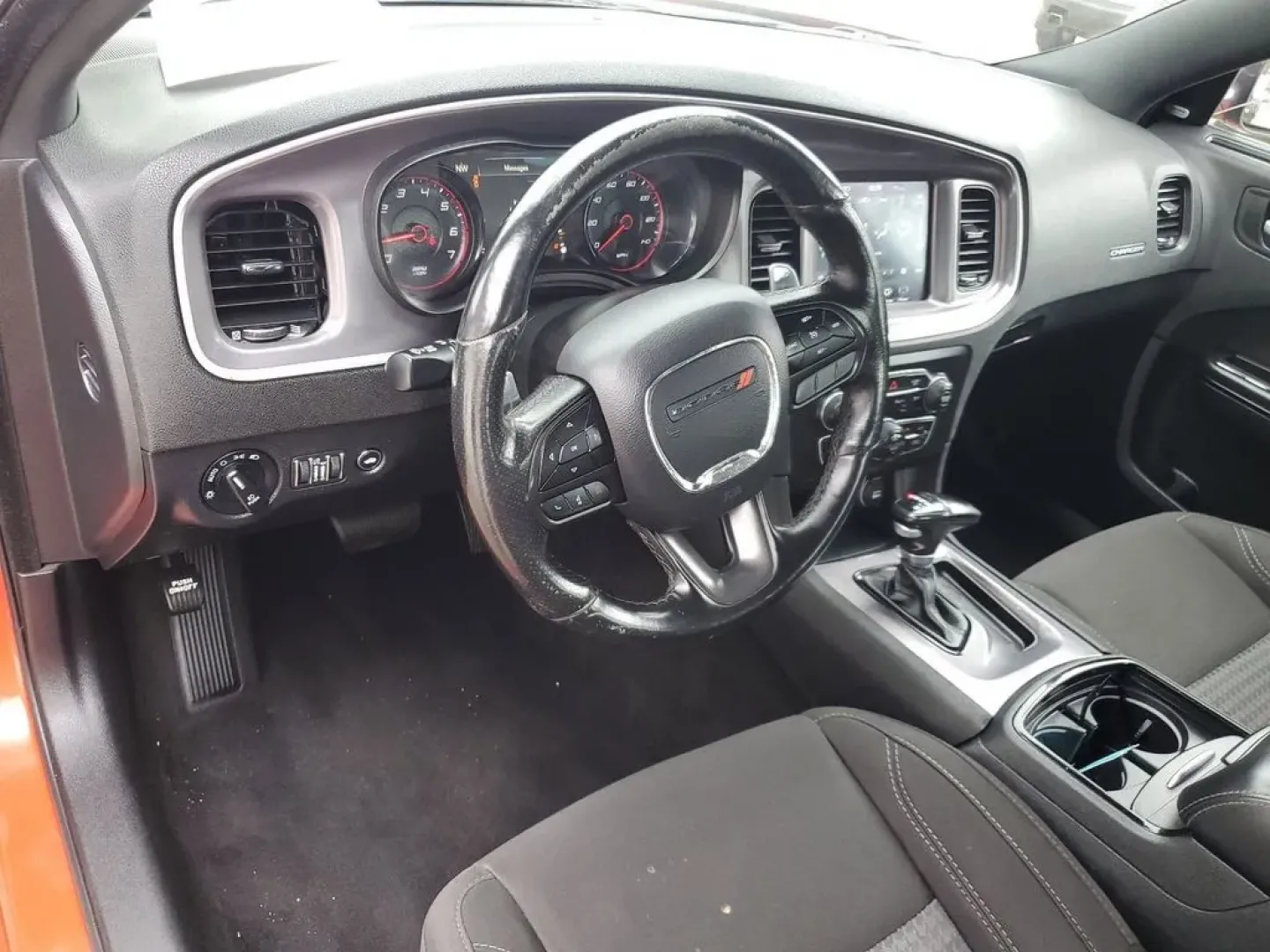 2020 Torred Clearcoat /Black Dodge Charger SXT (2C3CDXJG7LH) with an V6, 3.6L engine, 8-speed automatic transmission, located at 6064 Gull Rd, Kalamazoo, MI, 49048, (269) 222-0088, 42.328388, -85.512924 - <b>Summary</b><br>Aftermarket sport exhaust<br><br><b>Vehicle Details</b><br>Aftermarket sport exhaust. Looking for a dynamic blend of performance and comfort? Check out this 2020 Dodge Charger SXT, equipped with All-Wheel Drive and a powerful V6, 3.6L engine. This standout sedan balances thrilling - Photo#11