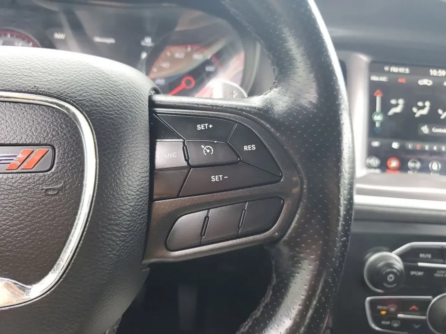 2020 Torred Clearcoat /Black Dodge Charger SXT (2C3CDXJG7LH) with an V6, 3.6L engine, 8-speed automatic transmission, located at 6064 Gull Rd, Kalamazoo, MI, 49048, (269) 222-0088, 42.328388, -85.512924 - <b>Summary</b><br>Aftermarket sport exhaust<br><br><b>Vehicle Details</b><br>Aftermarket sport exhaust. Looking for a dynamic blend of performance and comfort? Check out this 2020 Dodge Charger SXT, equipped with All-Wheel Drive and a powerful V6, 3.6L engine. This standout sedan balances thrilling - Photo#16