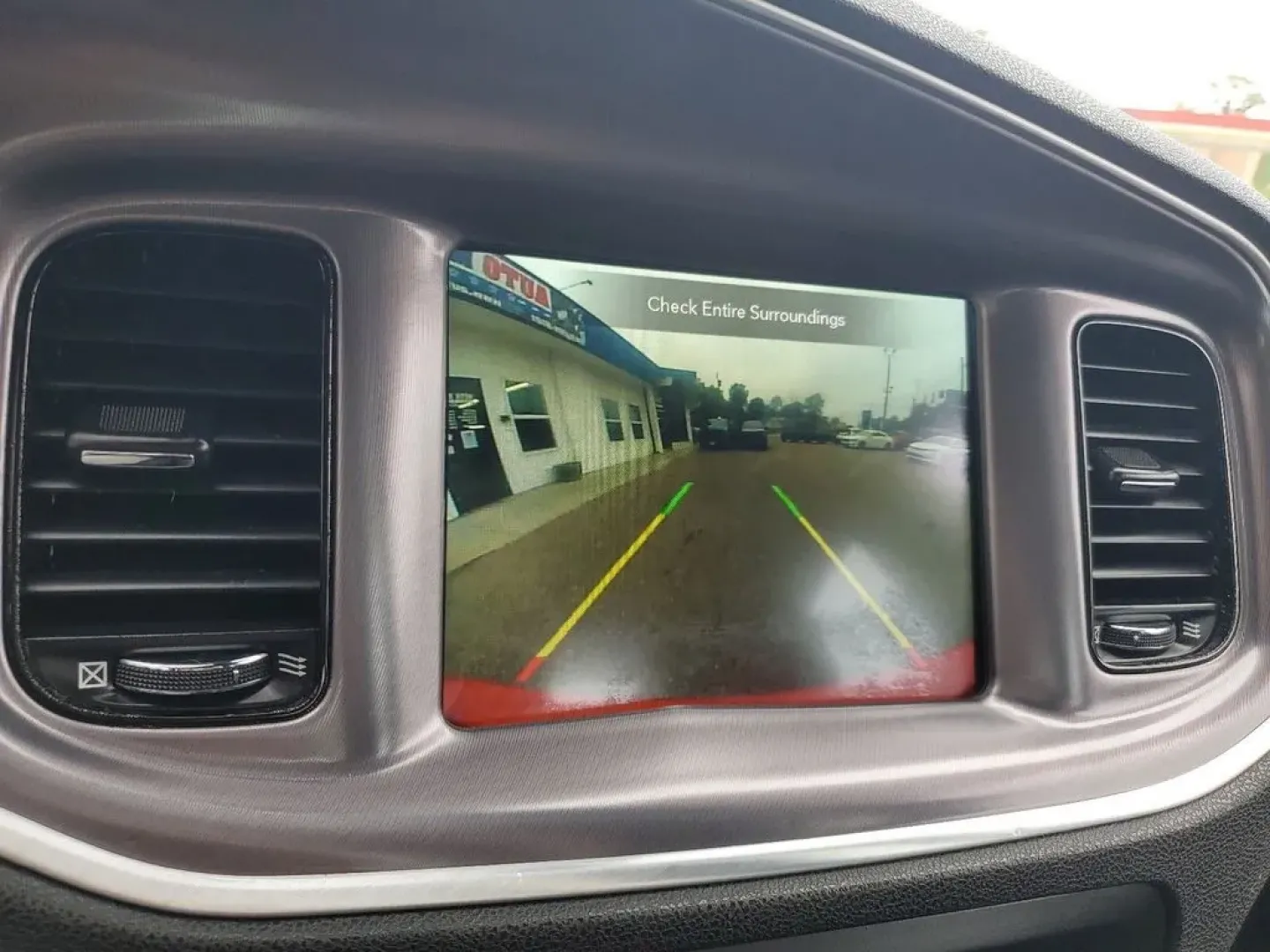 2020 Torred Clearcoat /Black Dodge Charger SXT (2C3CDXJG7LH) with an V6, 3.6L engine, 8-speed automatic transmission, located at 6064 Gull Rd, Kalamazoo, MI, 49048, (269) 222-0088, 42.328388, -85.512924 - <b>Summary</b><br>Aftermarket sport exhaust<br><br><b>Vehicle Details</b><br>Aftermarket sport exhaust. Looking for a dynamic blend of performance and comfort? Check out this 2020 Dodge Charger SXT, equipped with All-Wheel Drive and a powerful V6, 3.6L engine. This standout sedan balances thrilling - Photo#19