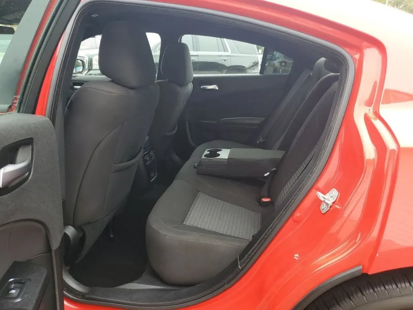 2020 Torred Clearcoat /Black Dodge Charger SXT (2C3CDXJG7LH) with an V6, 3.6L engine, 8-speed automatic transmission, located at 6064 Gull Rd, Kalamazoo, MI, 49048, (269) 222-0088, 42.328388, -85.512924 - <b>Summary</b><br>Aftermarket sport exhaust<br><br><b>Vehicle Details</b><br>Aftermarket sport exhaust. Looking for a dynamic blend of performance and comfort? Check out this 2020 Dodge Charger SXT, equipped with All-Wheel Drive and a powerful V6, 3.6L engine. This standout sedan balances thrilling - Photo#24